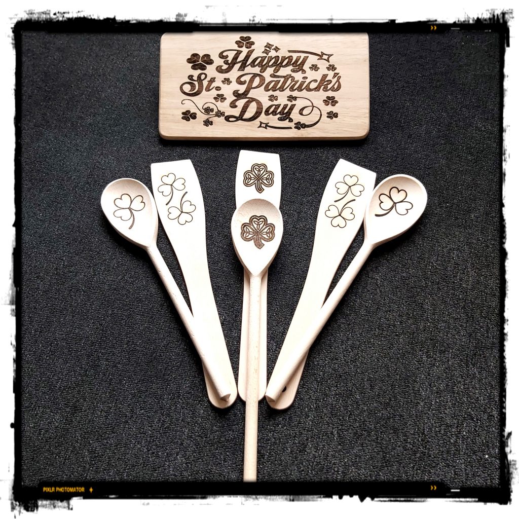 Some wood utensils laser engraved with clover design